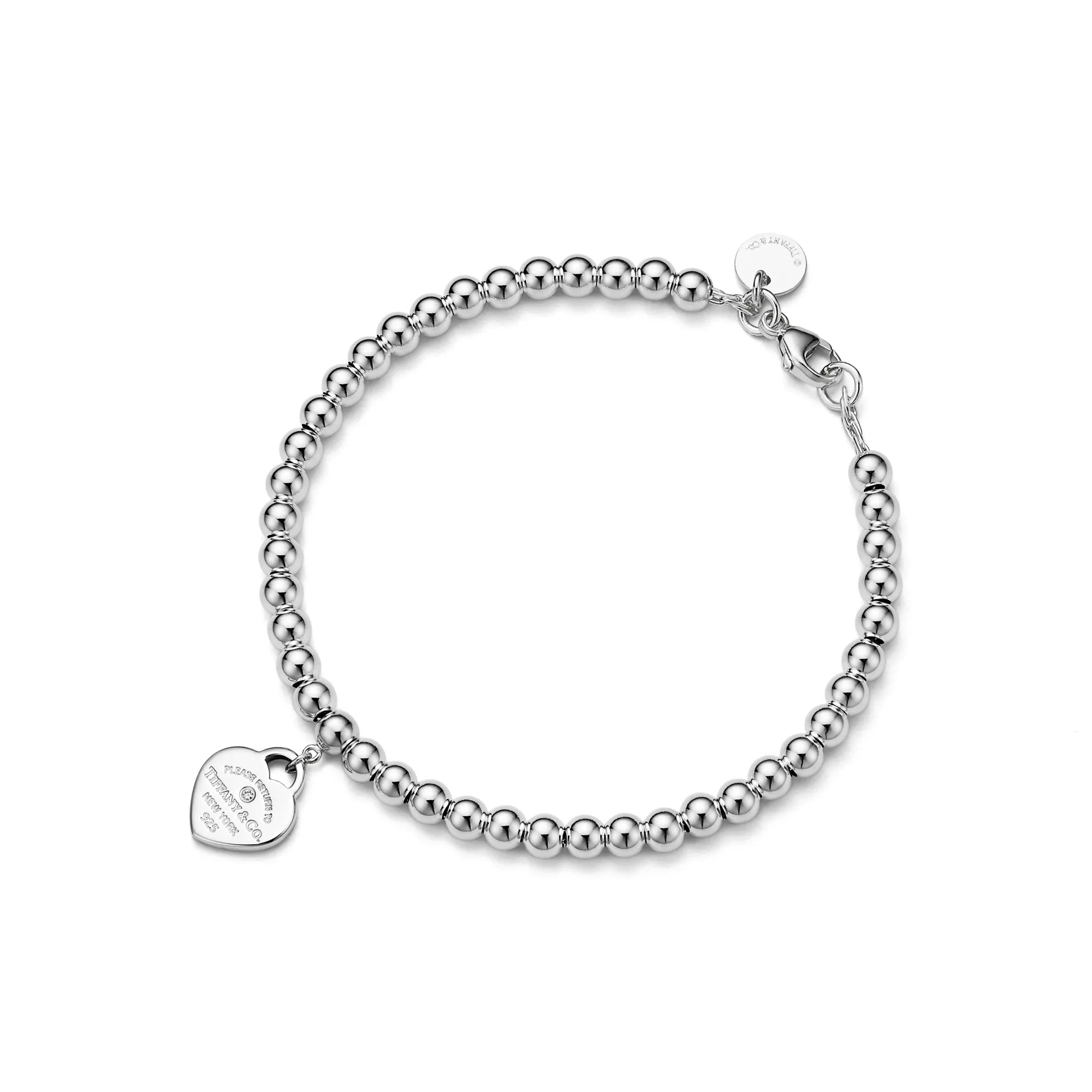 Tiffany & Co.: Pink Mini Heart Bead Bracelet in Silver with a Diamond, 4 mm