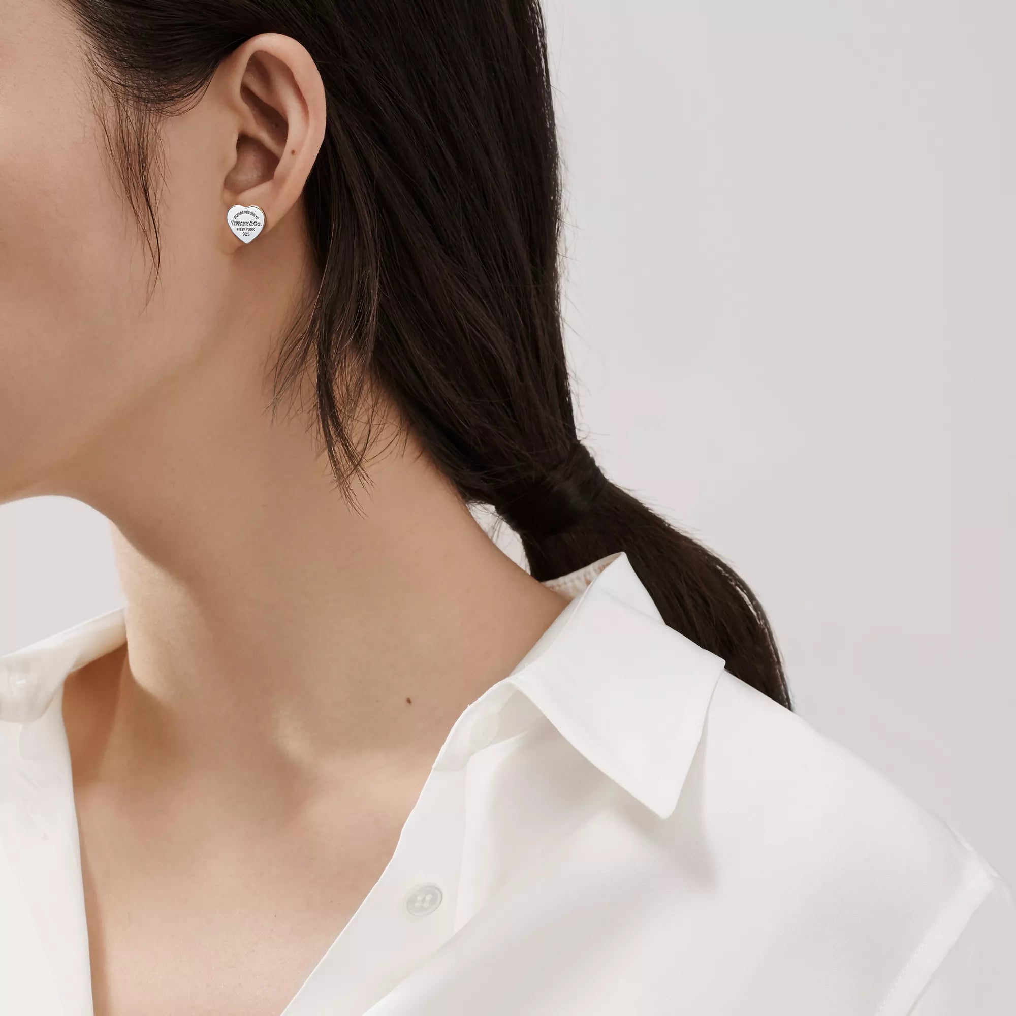 Tiffany & Co.: Heart Tag Stud Earrings in Silver